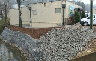 Gabion stone retaining wall at Mojo Burrito | Higher Ground of Chattanooga