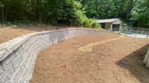 Finished retaining wall and zero scape yard